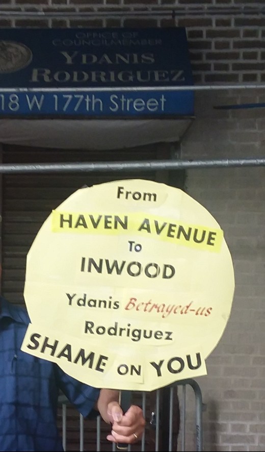 bob and protest sign